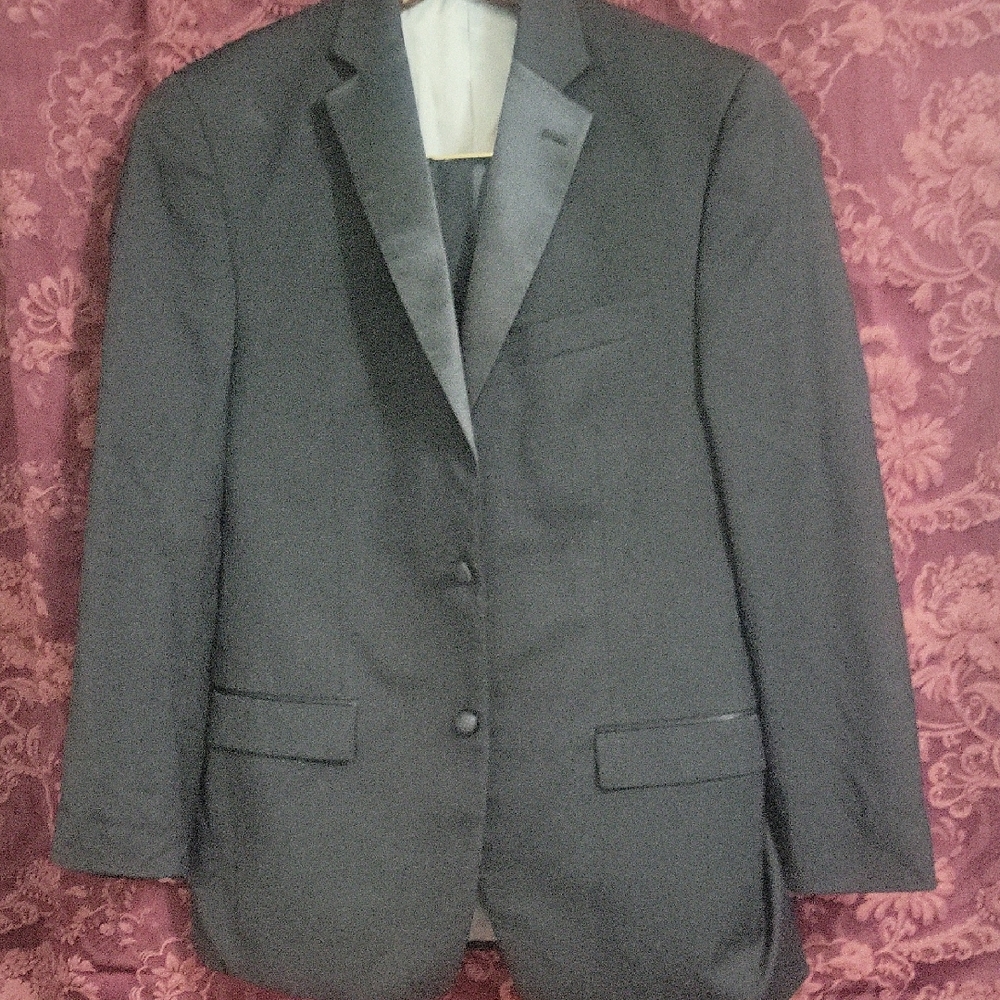Black Sport Coat with Notched Lapels and Textured Fabric